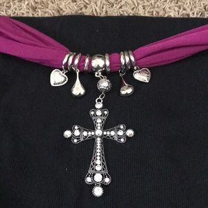 Scarf adorned with charms